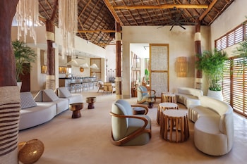 Sitting area in hotel lobby at Hotel Shibari Tulum - Restaurant & Cenote Club