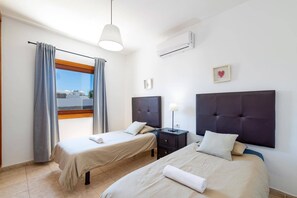 2 quartos, ferros/tábuas de passar roupa, Wi-Fi de cortesia