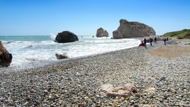 A pebbly beach with large boulders and a clear blue sky. - Villa Semeli by Villa Plus (Peyia)