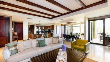 Luxury Condo | Living area | 60-inch Smart TV with cable channels, TV