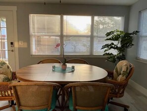 Enjoy meals in this cozy dining area with a round table and six comfortable chairs.
