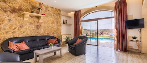 Maison, plusieurs lits | Coin séjour