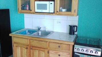 Fridge, microwave, stovetop, paper towels