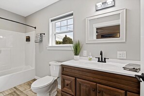 Combined shower/tub, hair dryer