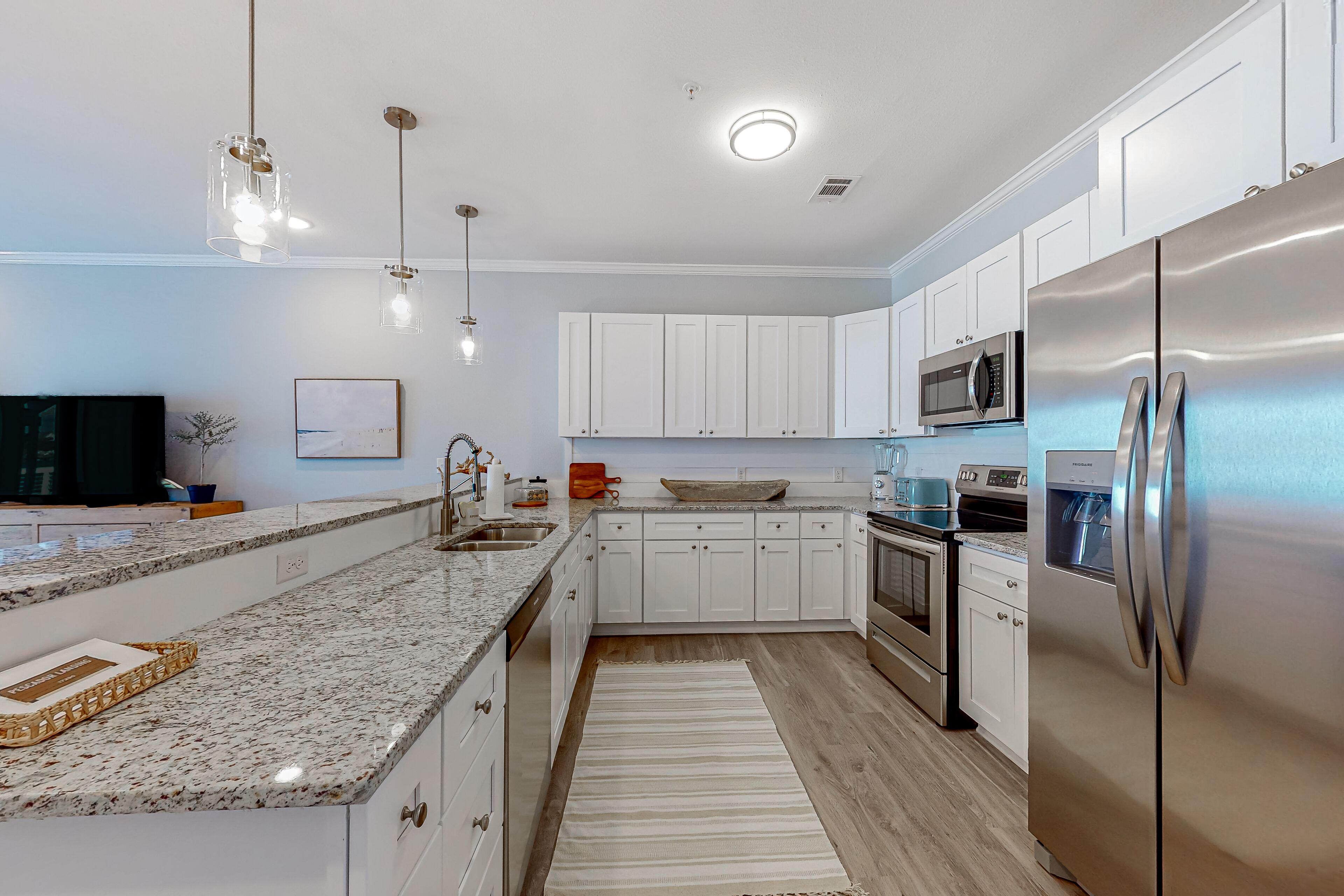 Intracoastal waterfront condo with full kitchen & patio - walk to Flora-Bama