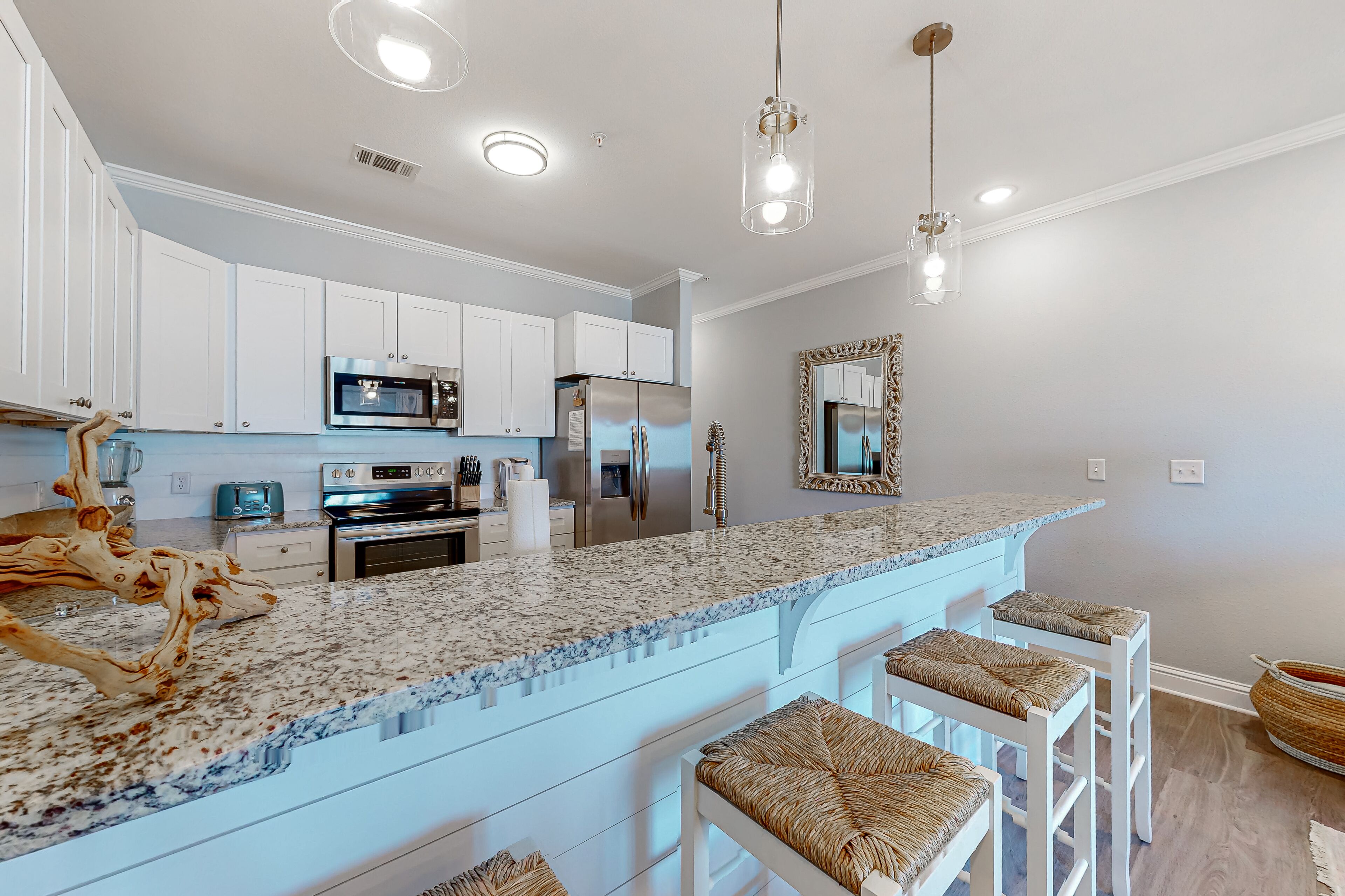 Intracoastal waterfront condo with full kitchen & patio - walk to Flora-Bama