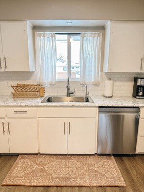 Fridge, microwave, oven, stovetop - Modern 4 Bedroom Home (Fallon)