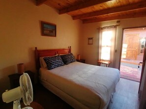 Standard Room, Multiple Beds, Garden Area | 10 bedrooms, free WiFi, bed sheets - Hostal Elim (Calama)