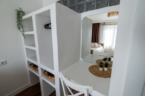 Design Condo, 3 Bedrooms, Terrace, City View | Premium bedding, desk, laptop workspace, iron/ironing board