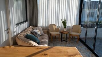 Design Condo, 3 Bedrooms, Terrace, City View | Living area | 128-inch TV with premium TV channels