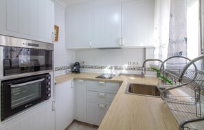 Oven, stovetop, dishwasher, cookware/dishes/utensils