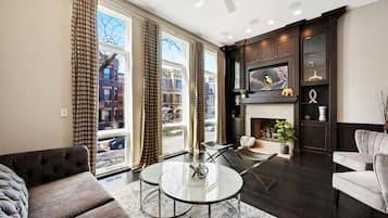 Smart TV, fireplace, books