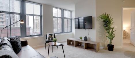 Business Apartment | Living room | 48-inch Smart TV with cable channels, TV, streaming services