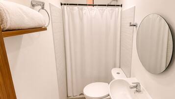 Standard Double Room | Bathroom | Shower, rainfall showerhead, towels, soap