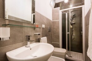 Shower, hair dryer, towels