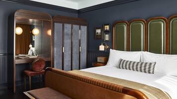 Premium bedding, down comforters, pillowtop beds, minibar