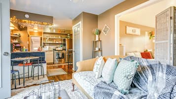 TV, fireplace, books