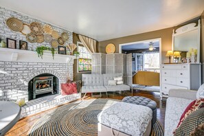 TV, fireplace, books