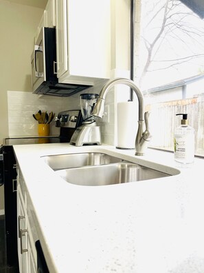 Fridge, microwave, oven, stovetop - Modern and Stylish updated home (Lake Dallas)