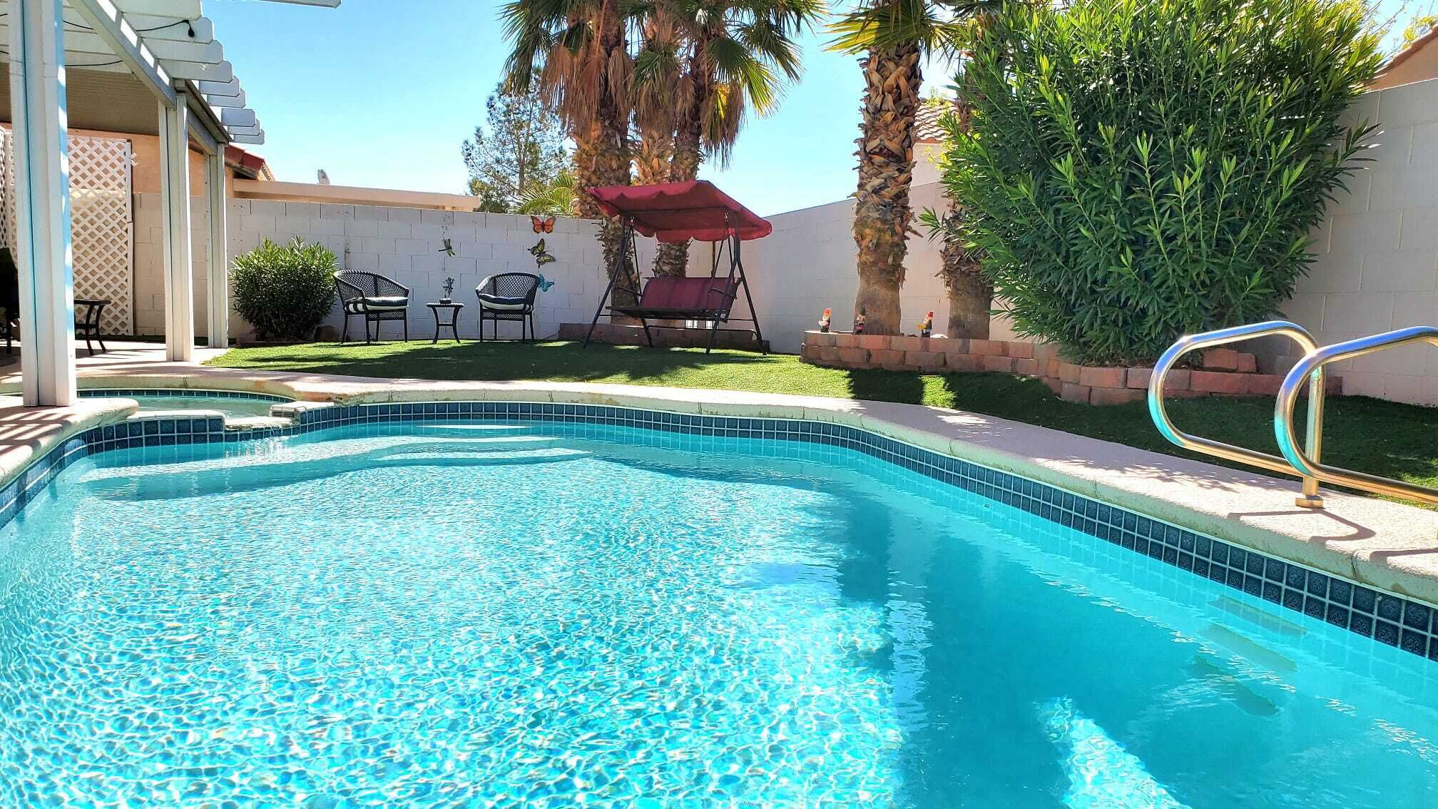 Comfortable family home. Relaxing backyard with a pool.