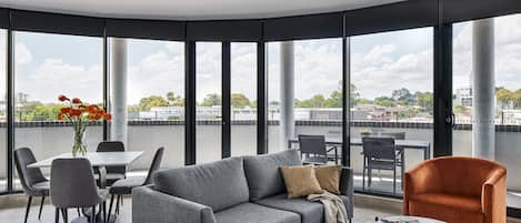 Executive One Bedroom Apartment - Open Plan | Living area | 50-inch Smart TV with satellite channels, TV, Netflix