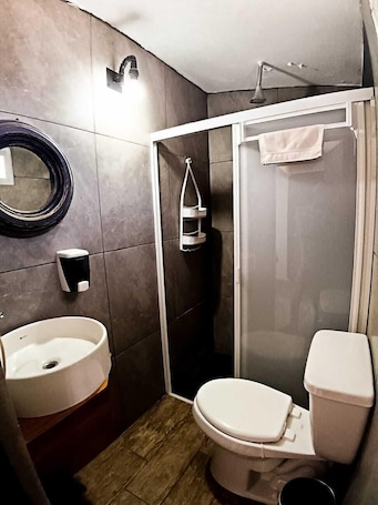Family Suite | Bathroom | Hair dryer, towels. Casa Salazar Durango