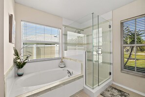 Shower, hair dryer, towels, soap
