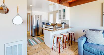 Warming single-level beachfront condo home with full kitchen & patio