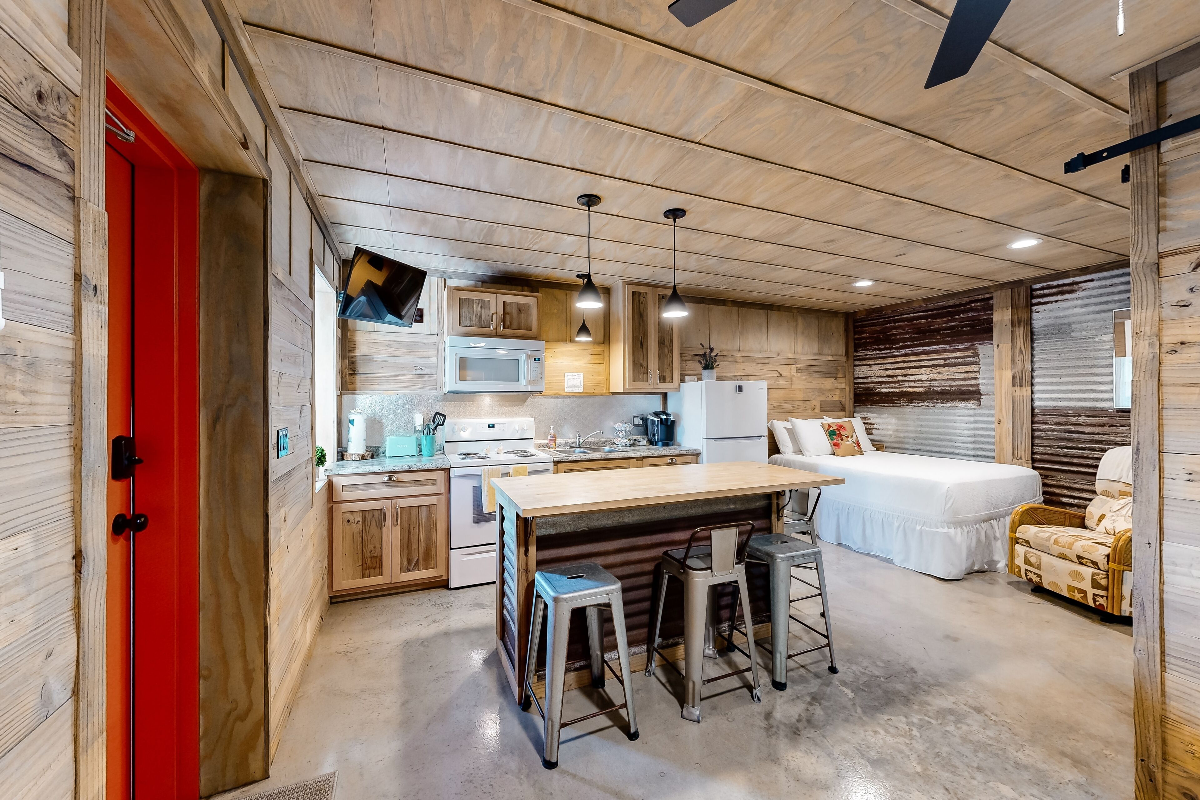 Rustic studio apartment with kitchenette, convenient location, & central AC