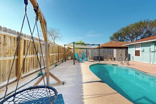 Well-appointed home with a pool, children's items, fireplace, washer/dryer, & AC