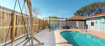 Well-appointed home with a pool, children's items, fireplace, washer/dryer, & AC