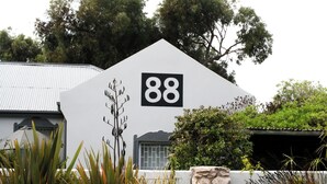 A building with a prominent number '88' on its facade. - Cozy Crner, home away from home, mere 100m away from pristine beaches (Langebaan)