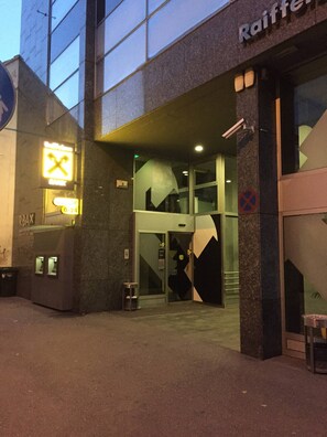 Raiffeisen features a striking glass facade and geometric entrance.