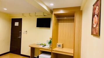 Desk, laptop workspace, free WiFi, bed sheets