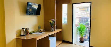 Desk, laptop workspace, free WiFi, bed sheets