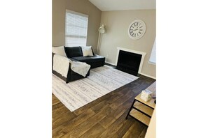 Smart TV, fireplace, books