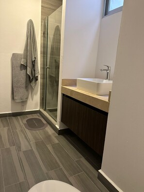 Hair dryer, towels, soap, shampoo