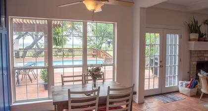 Come enjoy our peaceful house oasis that features a backyard patio with a pool!