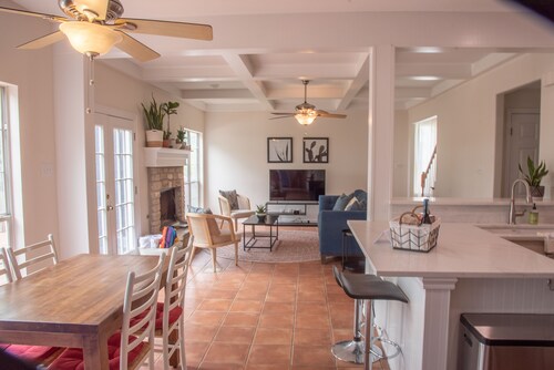 Come enjoy our peaceful house oasis that features a backyard patio with a pool!