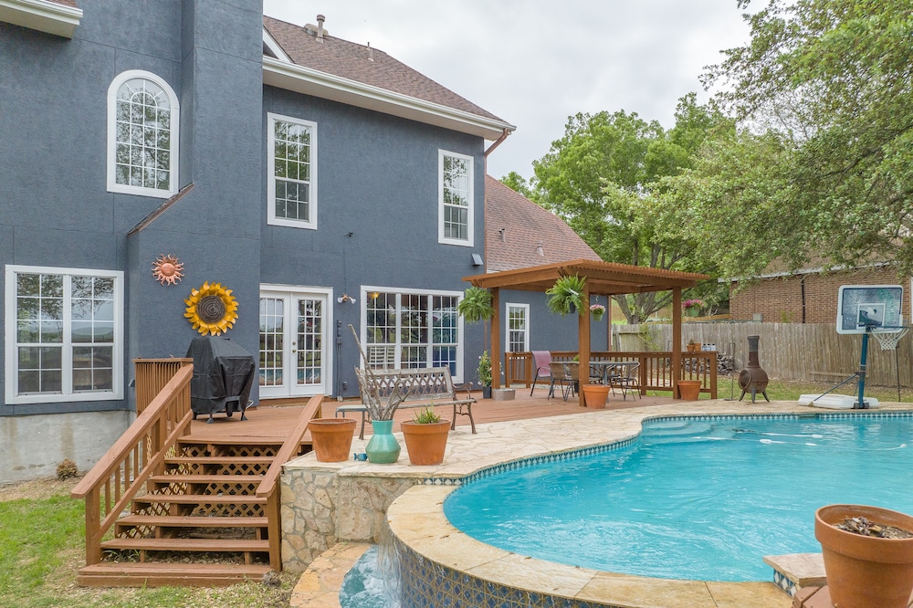 Come enjoy our peaceful house oasis that features a backyard patio with a pool!