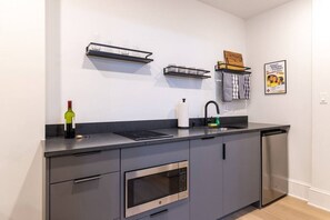 Fridge, microwave, stovetop, coffee/tea maker