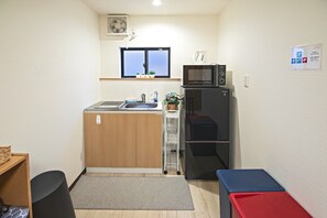 Fridge, microwave, cookware/dishes/utensils