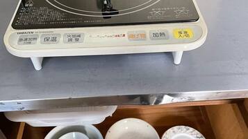 Fridge, microwave, stovetop, cookware/dishes/utensils