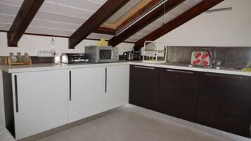 Fridge, oven, stovetop, espresso maker