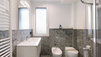 Shower, free toiletries, hair dryer, towels