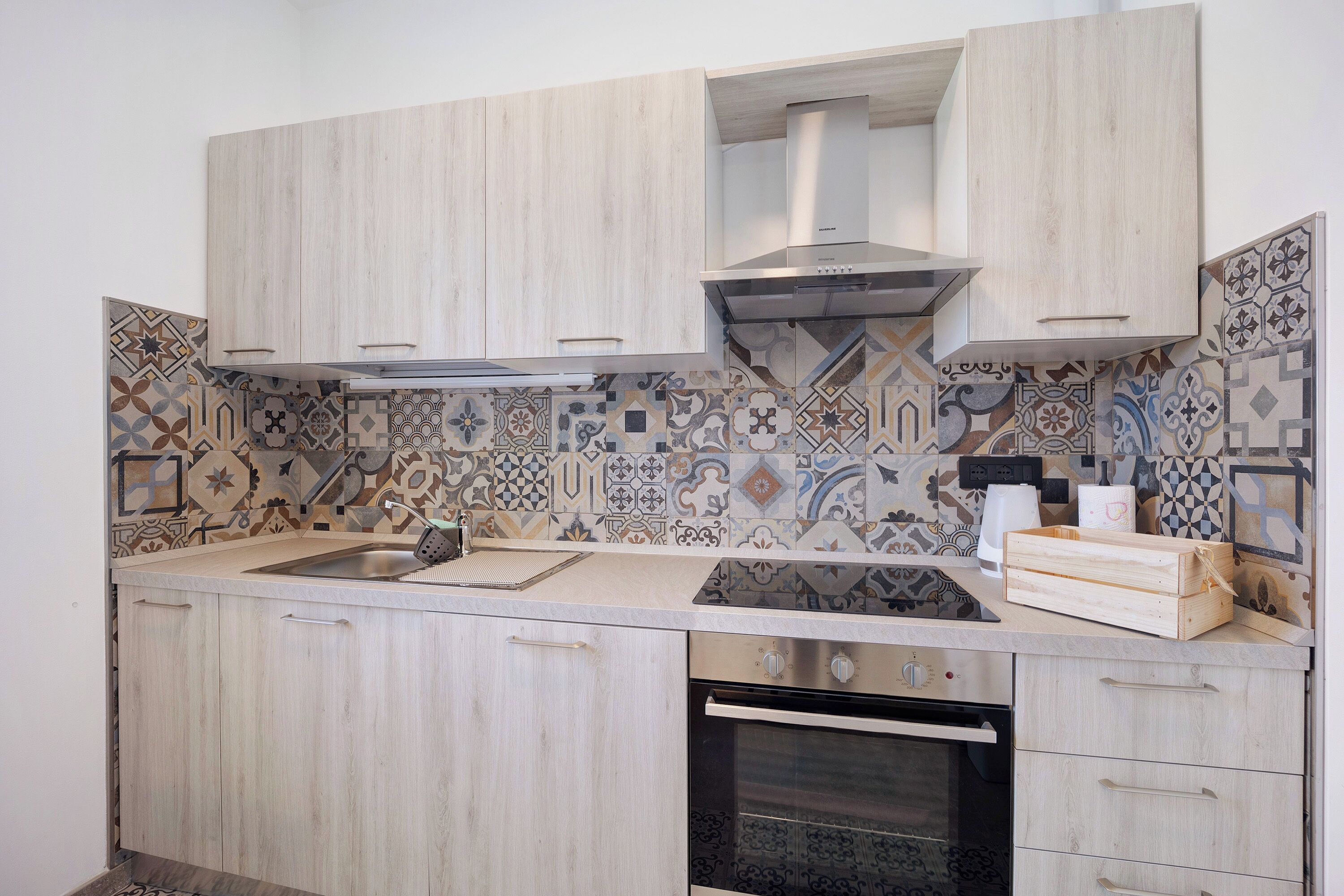 Réfrigérateur, four, plaque de cuisson, lave-vaisselle