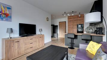 City-Apartment, 1 Schlafzimmer, Balkon | 1 Schlafzimmer, individuell dekoriert, individuell eingerichtet