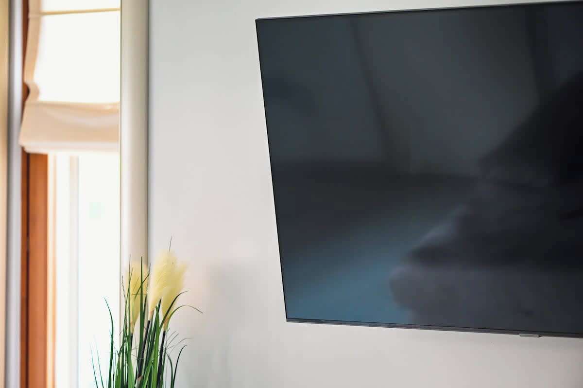 A flat-screen TV mounted on a wall.
