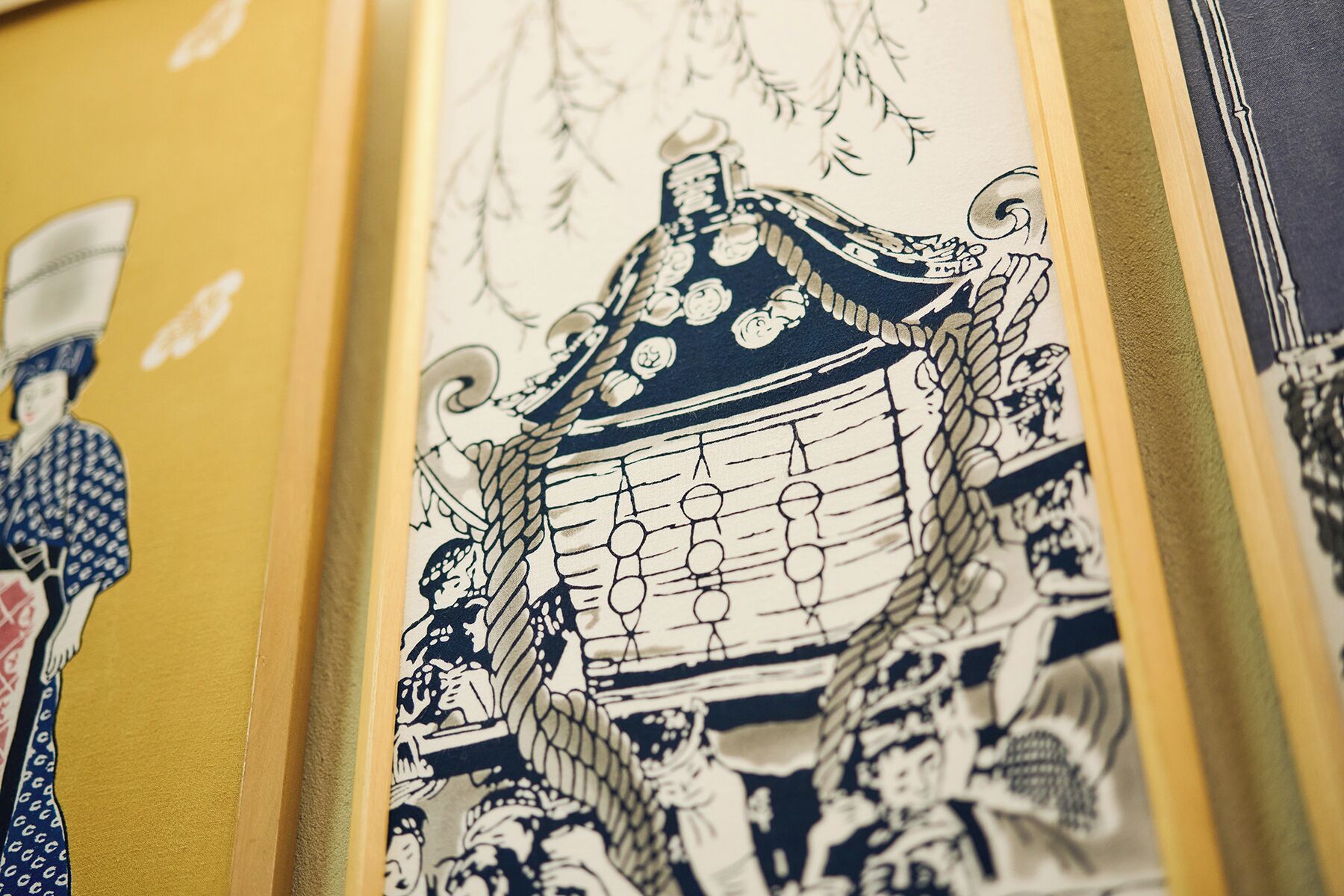 A detailed illustration of a traditional Japanese building with intricate architectural details and a crowd of people.