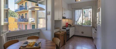 Fridge, oven, electric kettle, cookware/dishes/utensils